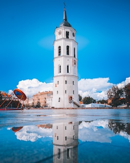 a white building with a clock tower