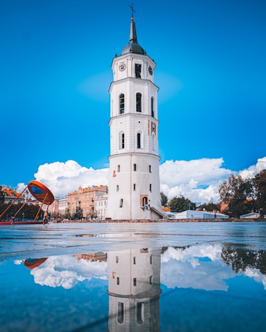 a white building with a clock tower