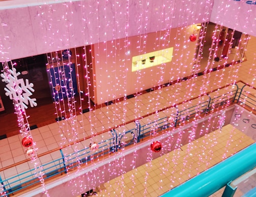 Colorful event signage and decorations setting the mood for a mall promotion.