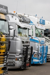 a group of trucks are parked