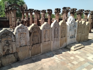 a stone wall with carvings