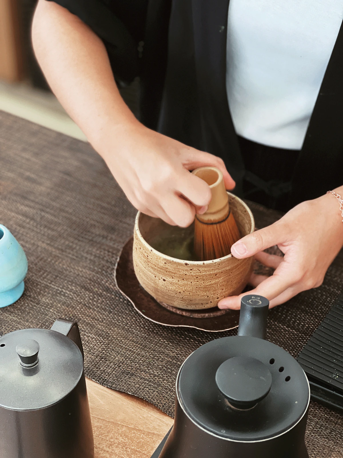 Matcha powder and tea tools arranged in soft natural light