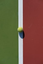 a tennis ball on a racket