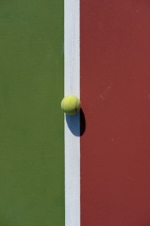a tennis ball on a racket