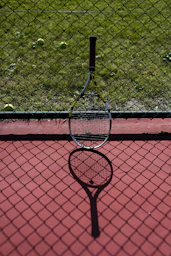 a tennis racket on a court