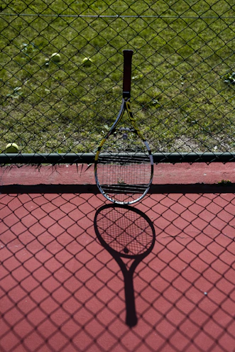 a tennis racket on a court
