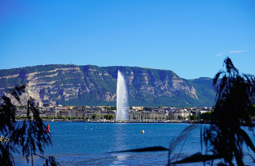 a large fountain in a lake