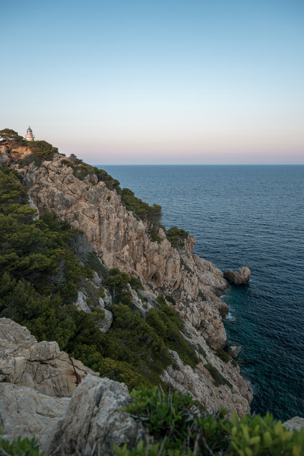 a rocky cliff overlooking the ocean