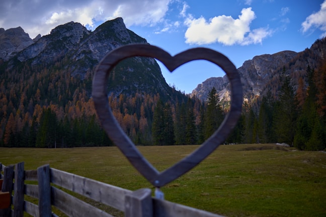 A beautifully crafted metal photo frame showcasing a scenic landscape.