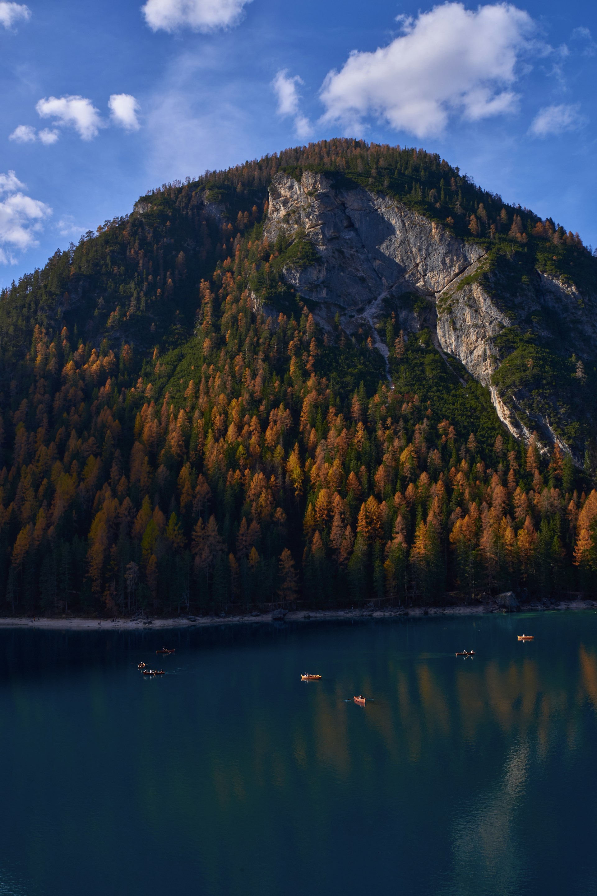 a lake with a mountain in the background
