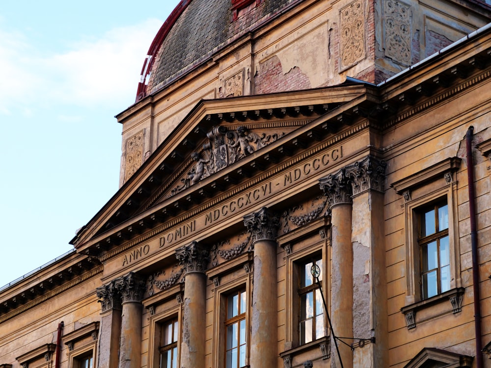 a building with a large sculpture on the side