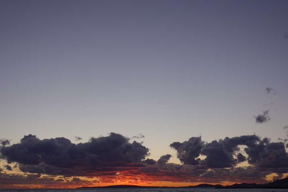 a sunset with clouds