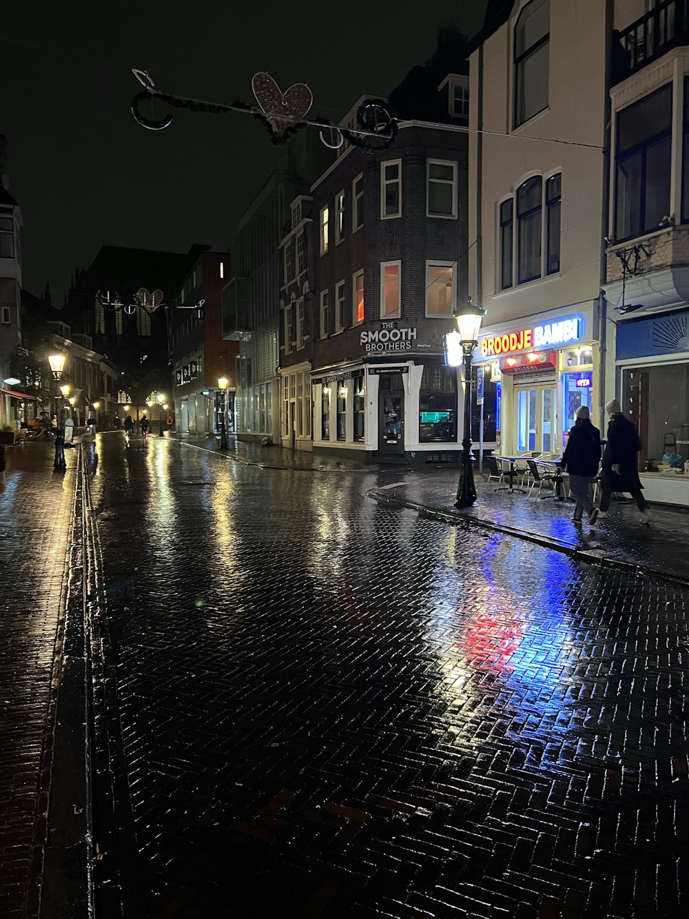 a wet street at night