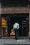 a man standing outside a store