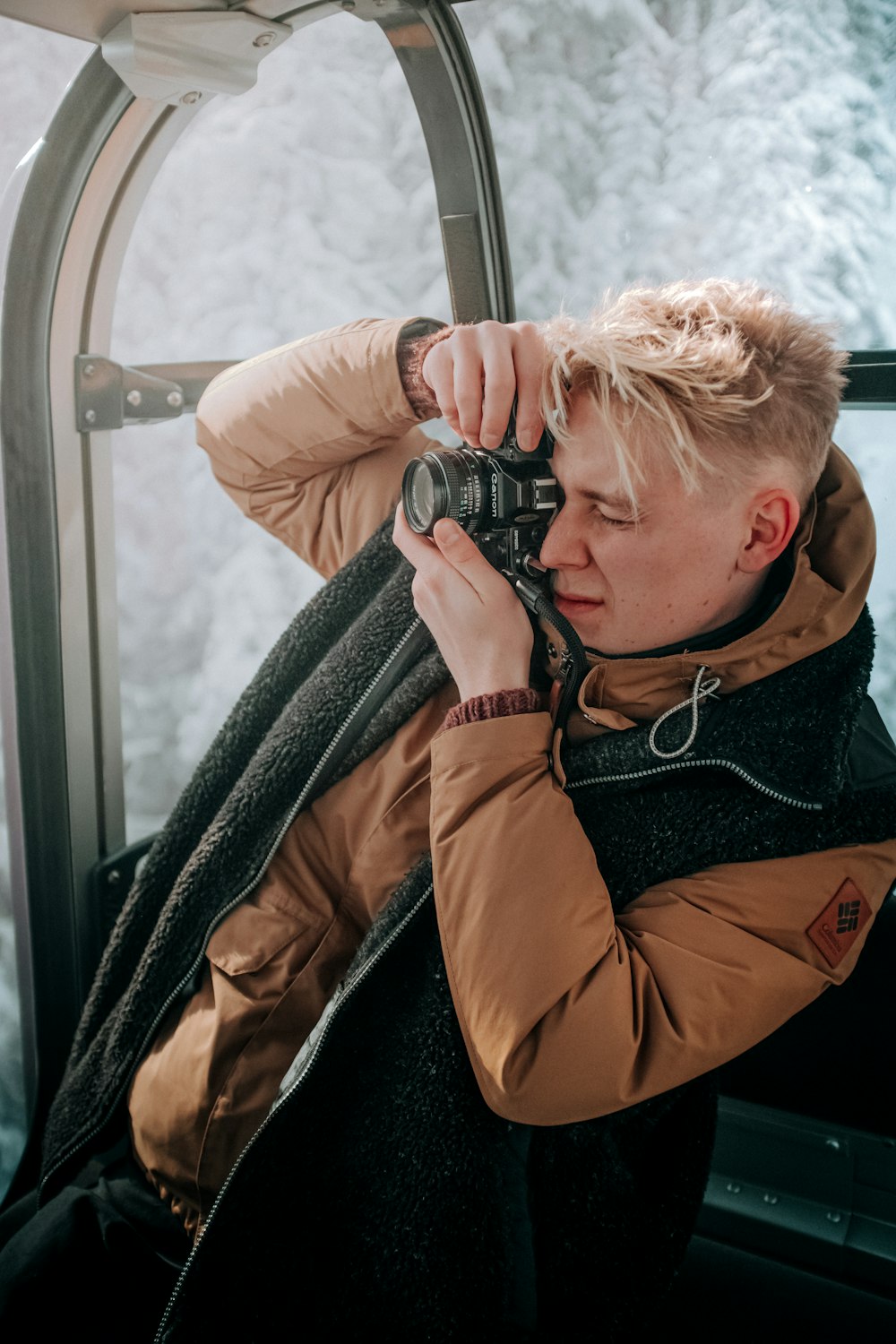 a woman holding a camera