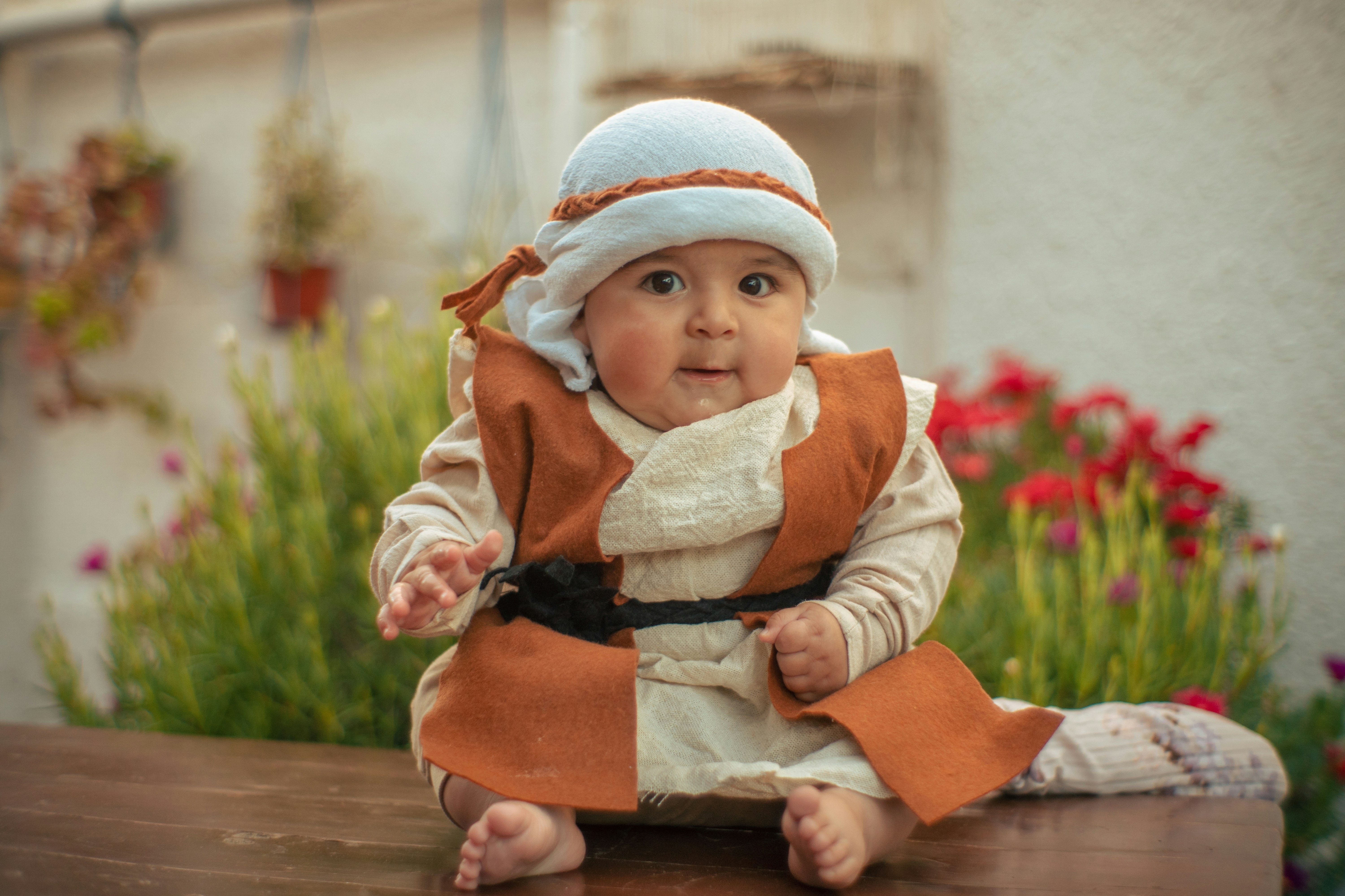 a baby sitting on a table