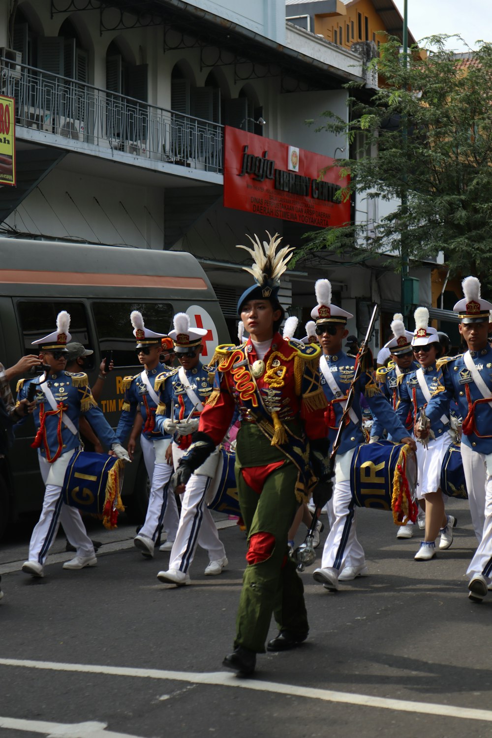 a group of people in uniform marching