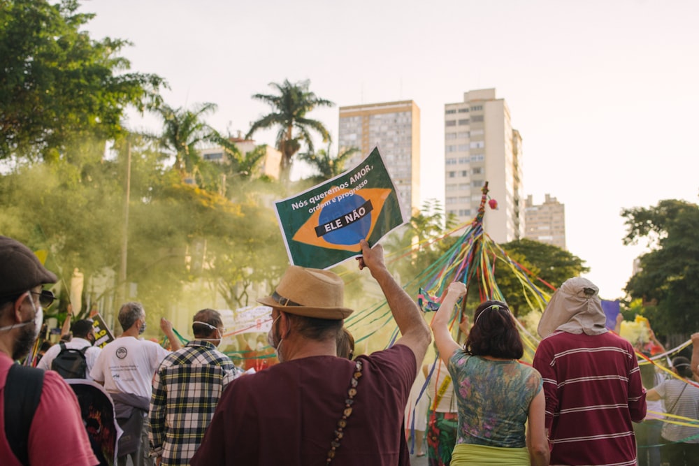 a group of people holding a flag