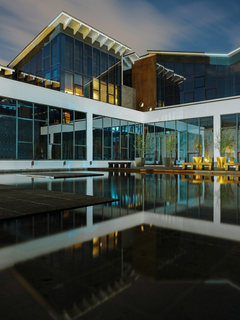 a building with a pool in front