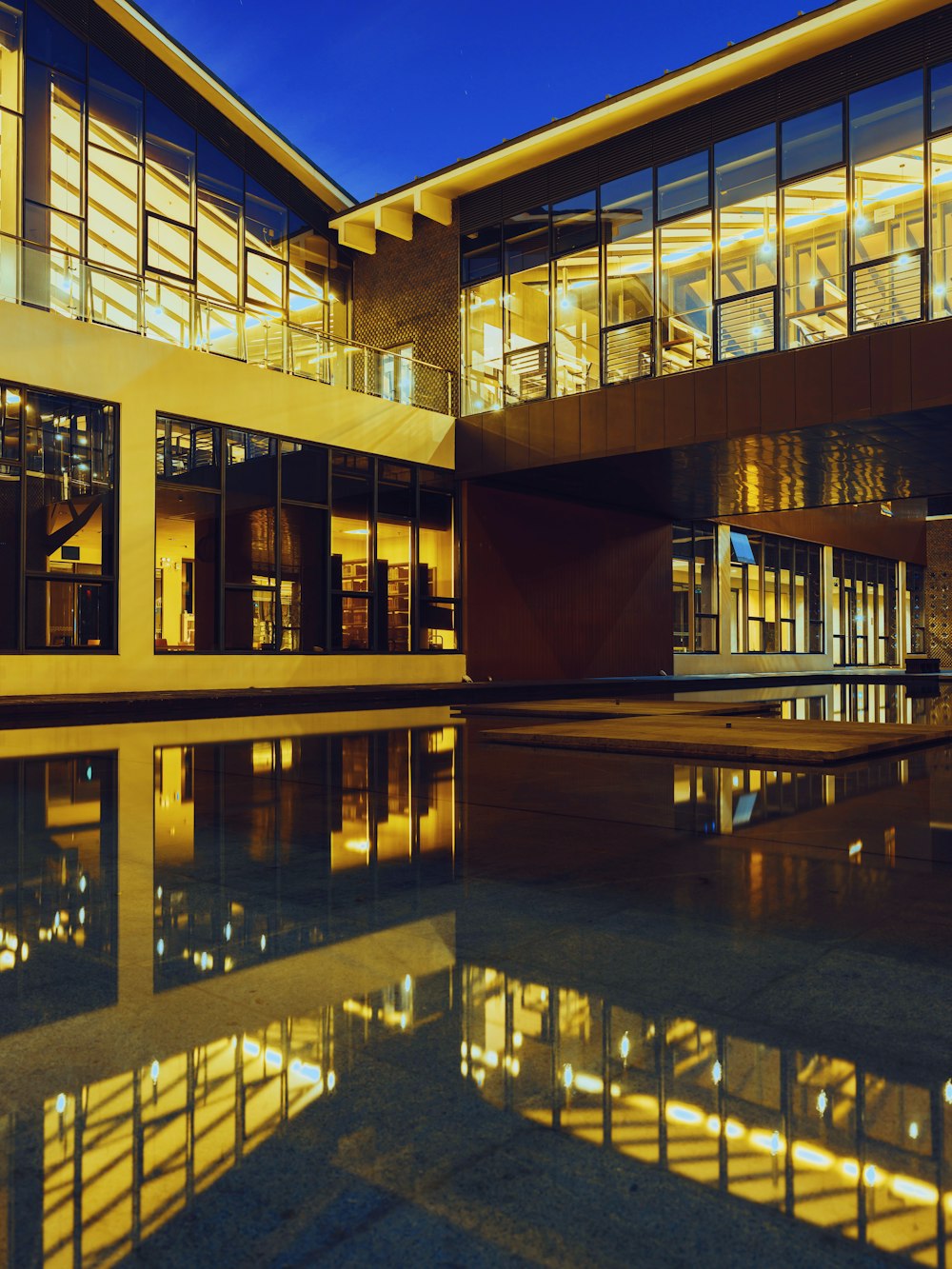 a building with windows and a pool