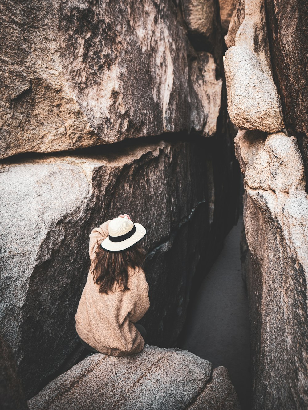 a person standing on a rock