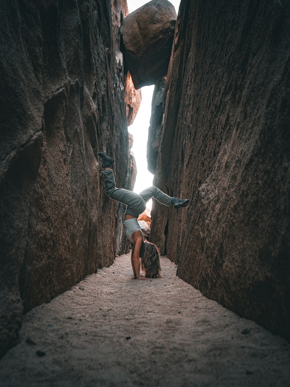 a person climbing a rock wall