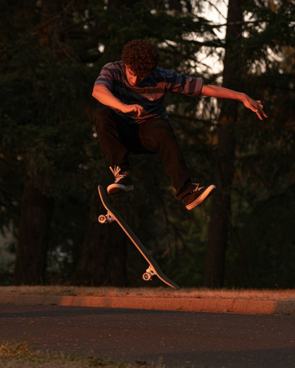 a man jumping with a skateboard