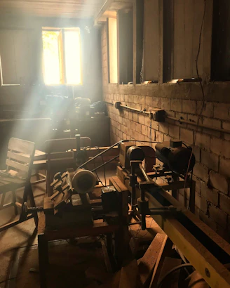 A warm, inviting workspace with a craftsman carefully measuring wood, sunlight streaming through a nearby window.