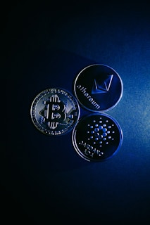 a group of blue and silver coins