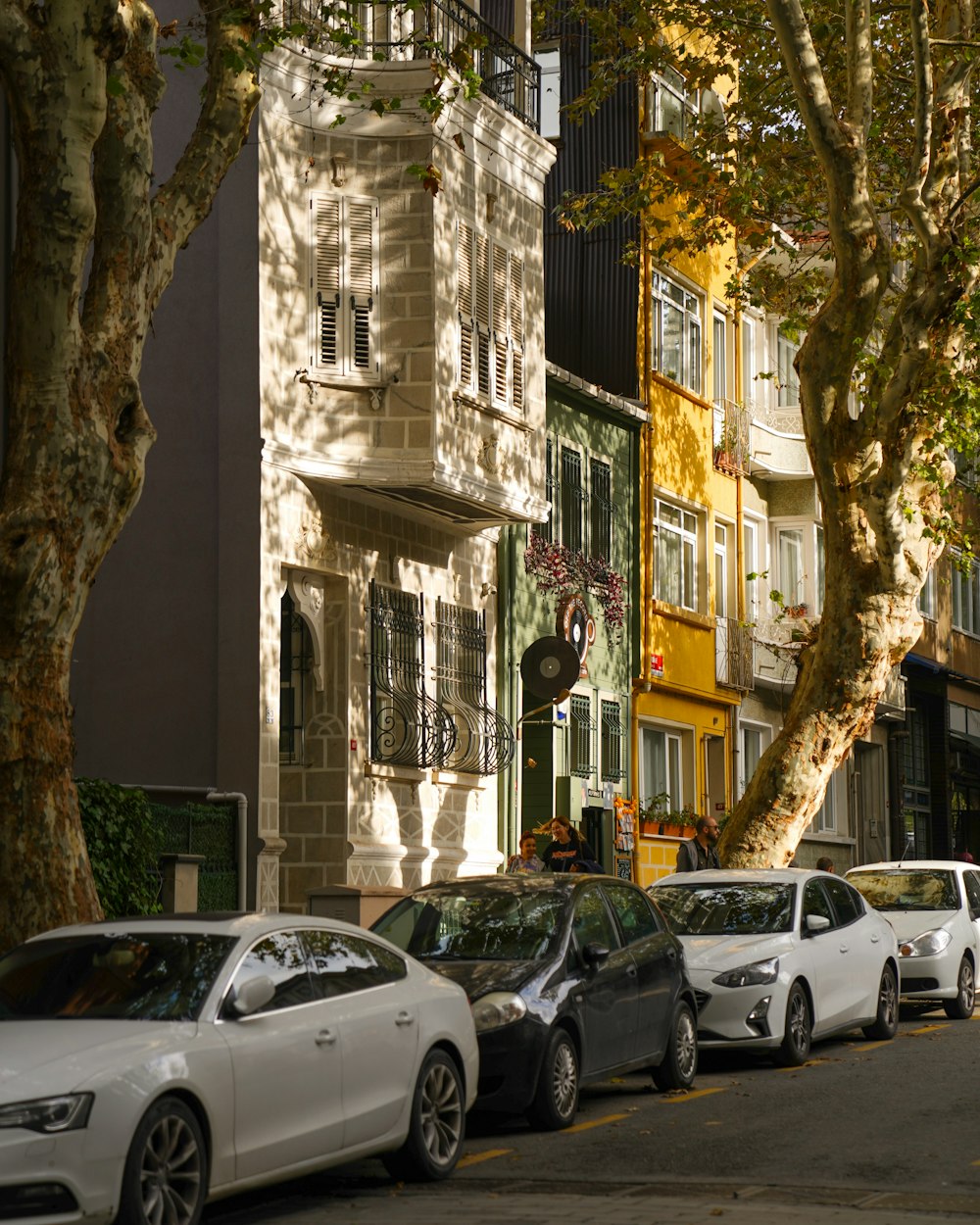 cars parked on the side of a street