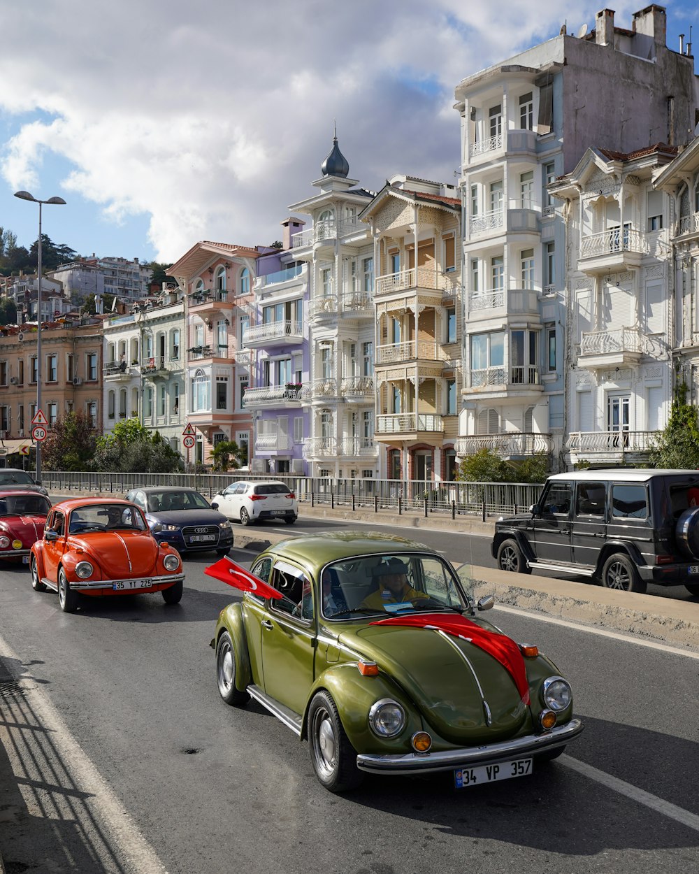 a group of cars on a street