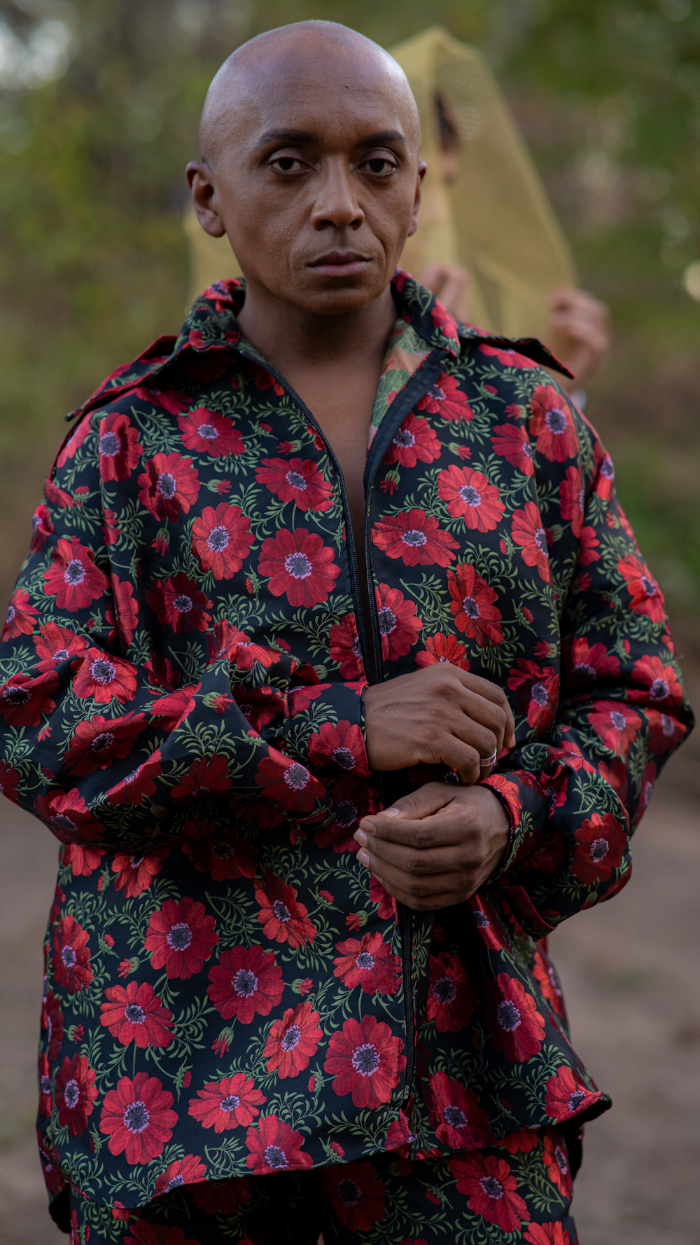 a man wearing a colorful shirt