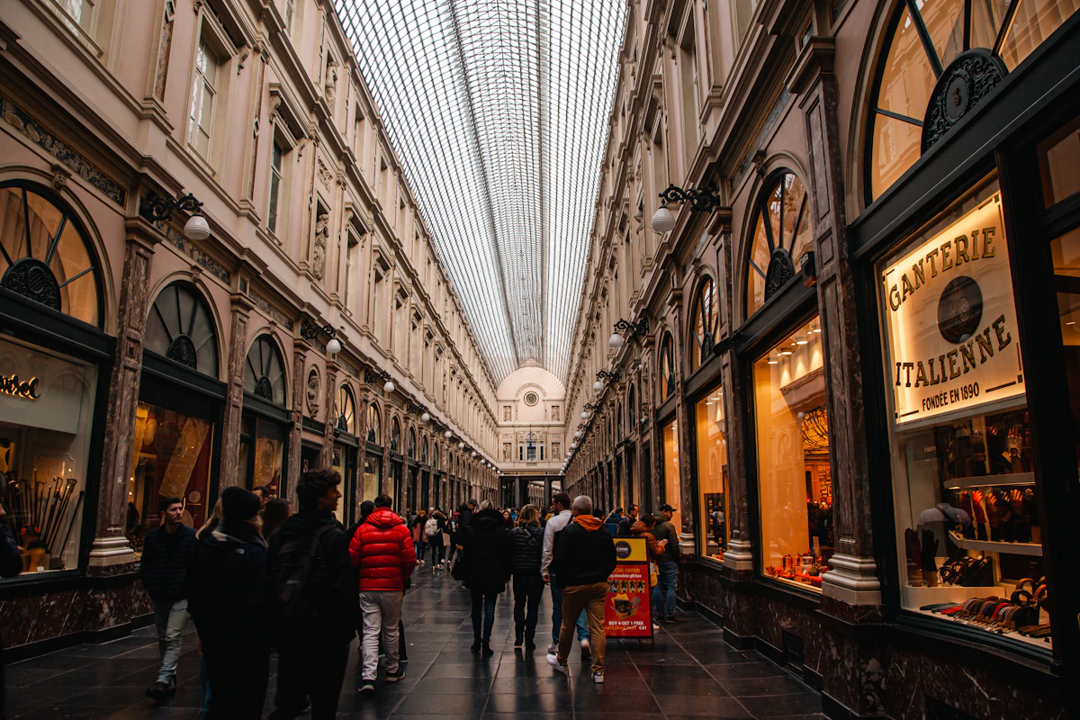 People walking in the Galeries Royales Saint-Hubert in Brussels