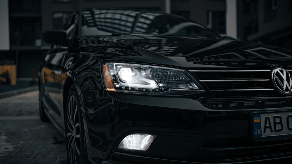 a black car parked on a street