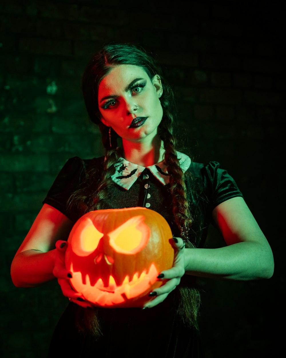 a person holding a pumpkin