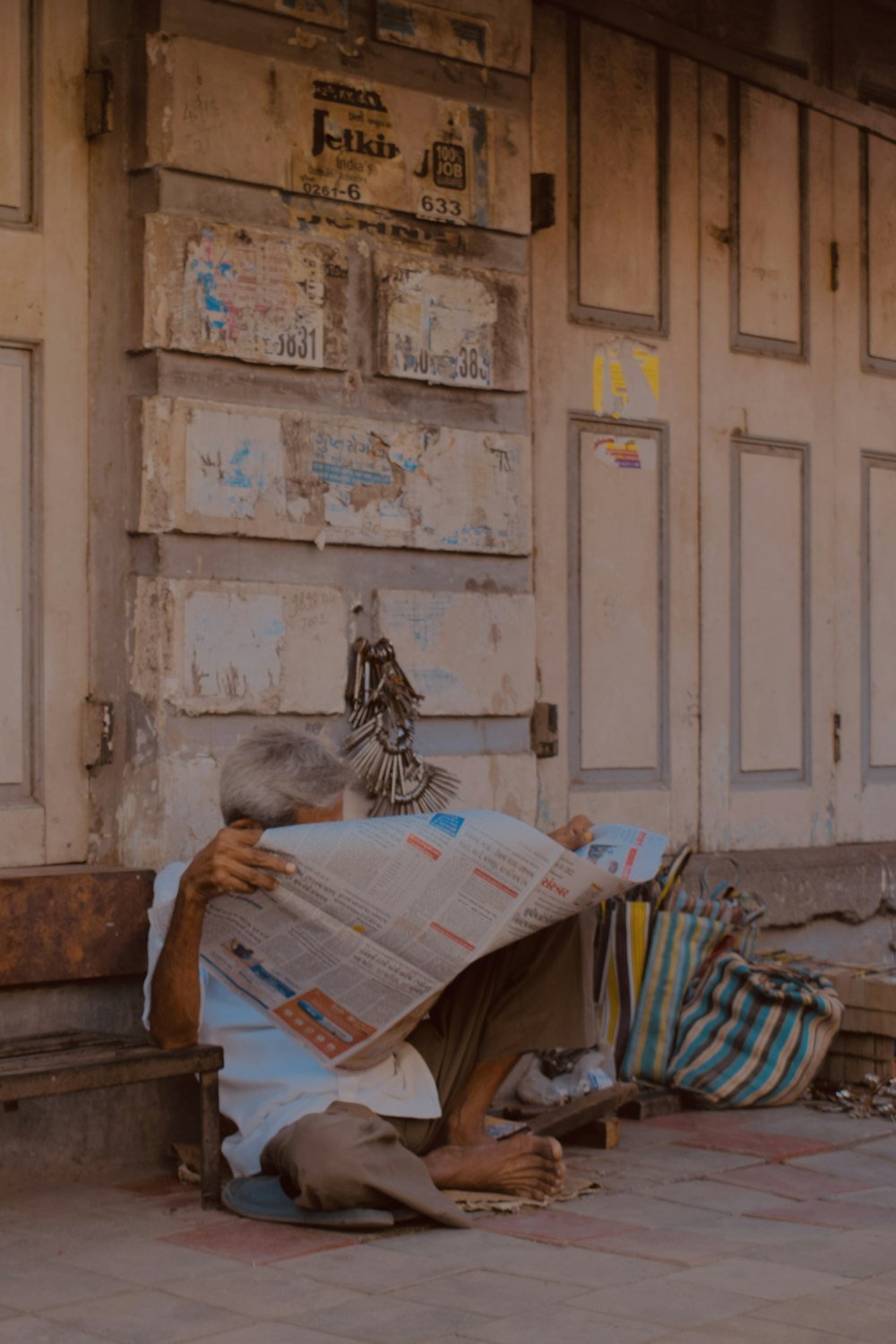 a person reading a newspaper