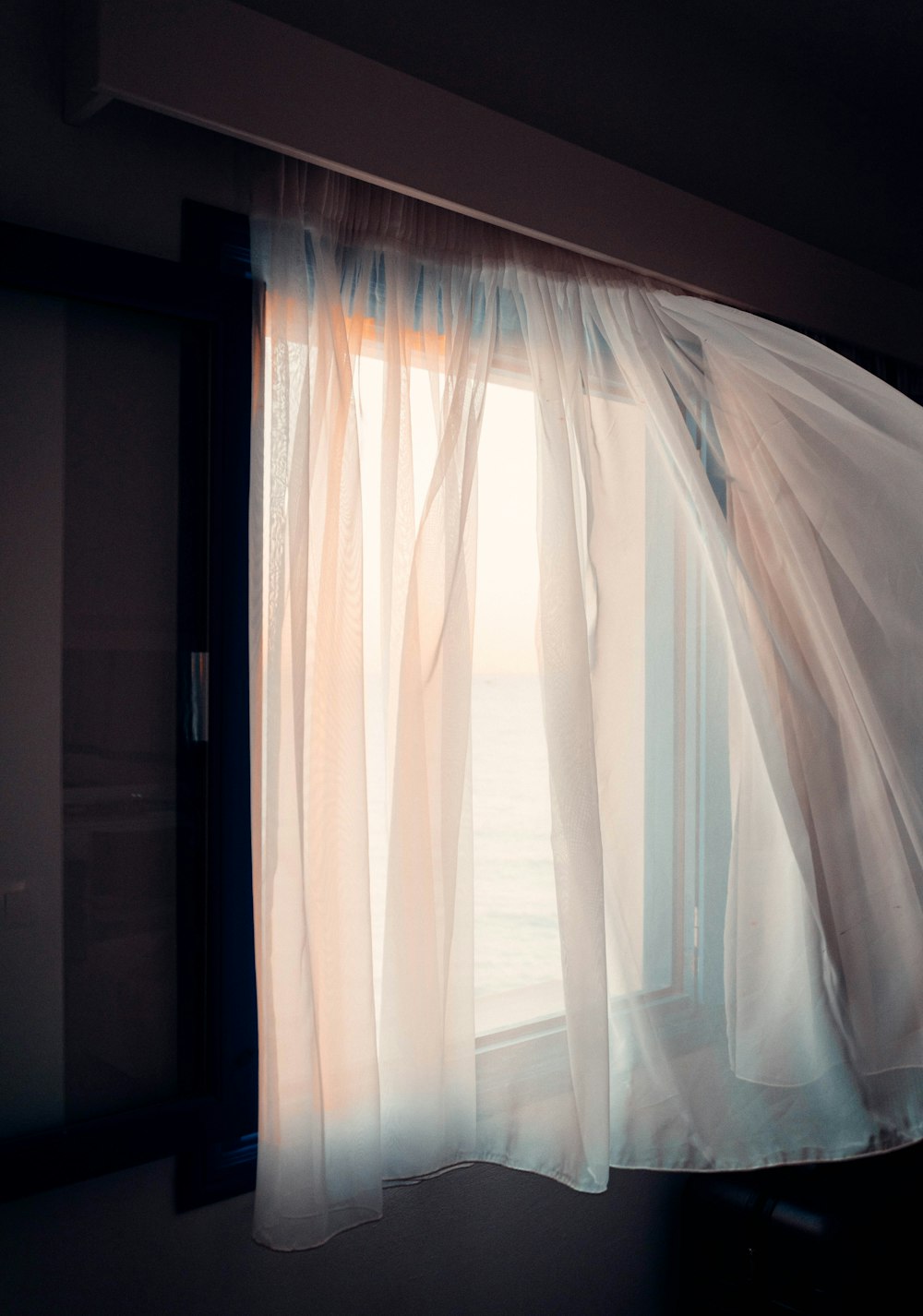 a window with a curtain