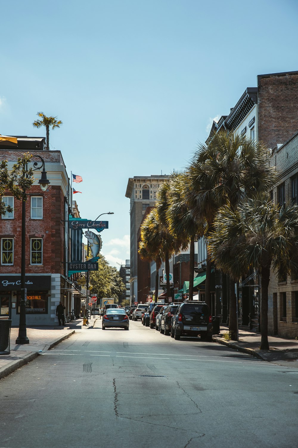 a street with cars parked on the side