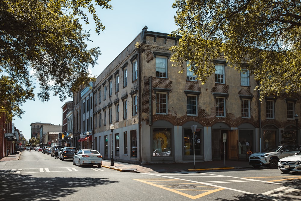 a street with cars and buildings along it