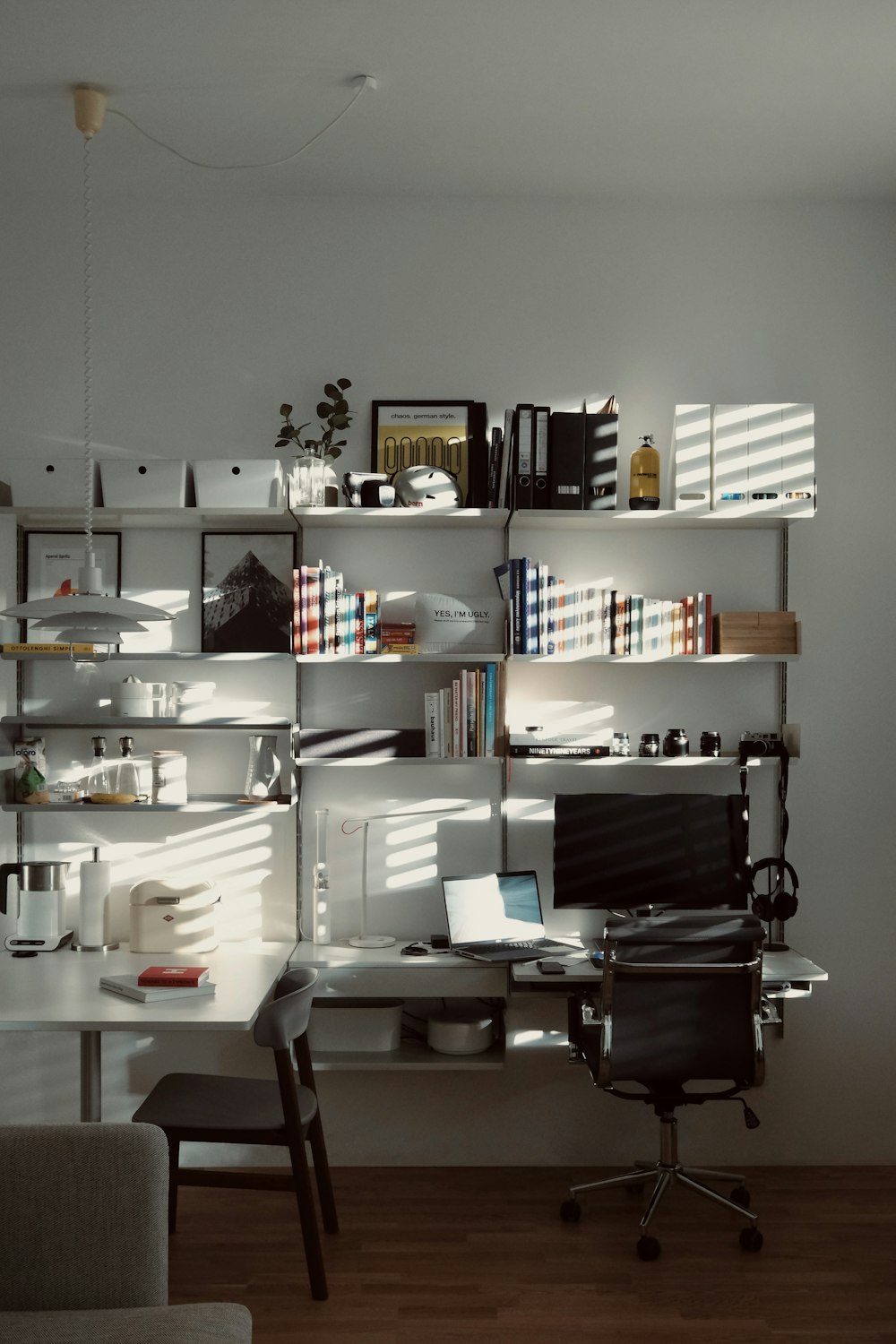 a desk with a laptop on it