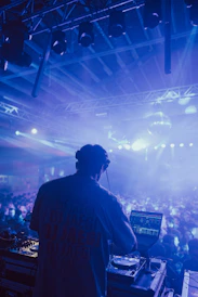 a man standing in front of a large crowd