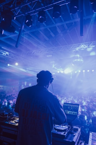 a man standing in front of a large crowd