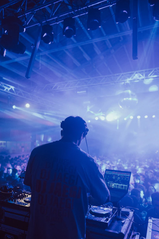 a man standing in front of a large crowd