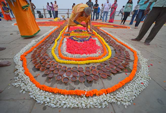 a person cutting a cake