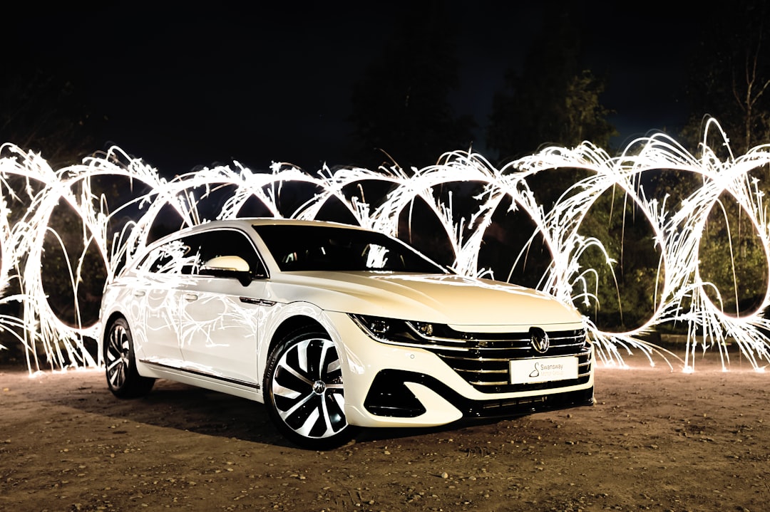 a car parked on a dirt road with fireworks in the background, BOOM! Now that