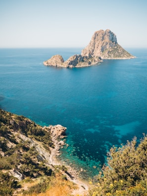 a rocky island in the ocean