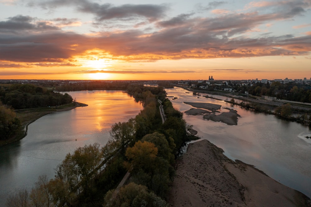 a river with a sunset