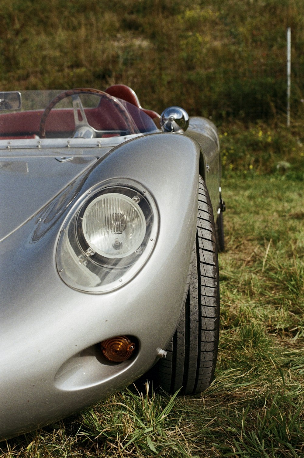 a car parked in a grassy area