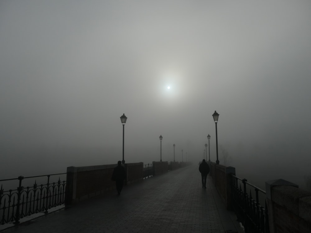 a person walking on a bridge