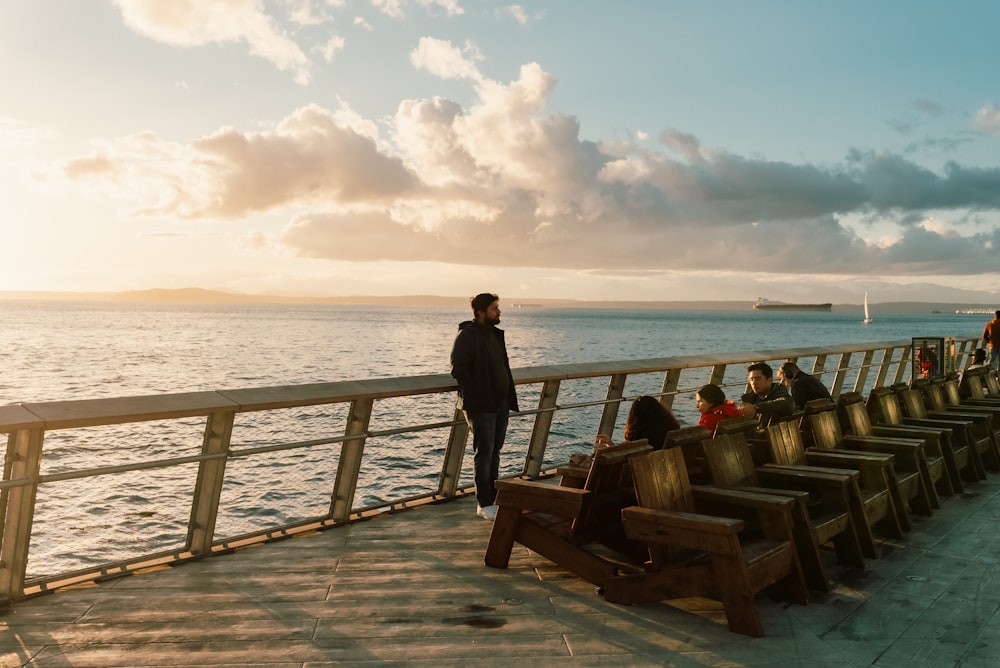 a person standing on a pier